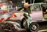 Lý do người phụ nữ chạy xe máy chèn ô tô rồi đập vỡ kính chắn gió