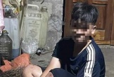 Điều tra vụ cháu bé nghi bị xích chân, đánh đập bằng thanh sắt