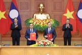 Việt Nam và Lào trao nhiều văn kiện hợp tác quan trọng